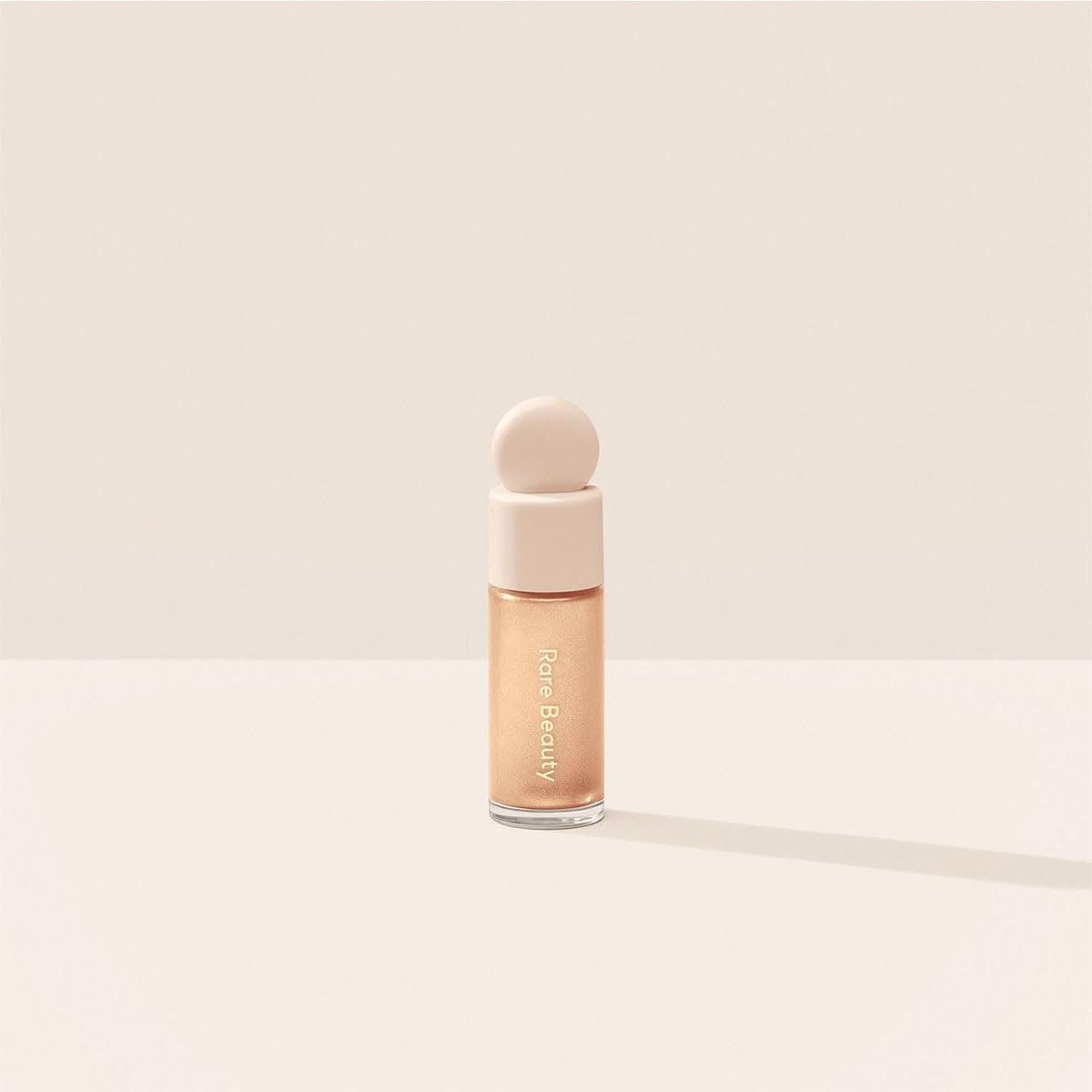 Mini Liquid Luminizer in Positive Light by Rare Beauty